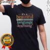 Pretty vintage t-shirt featuring 'It's A Beautiful Day For Language Learning' design, perfect for language enthusiasts.