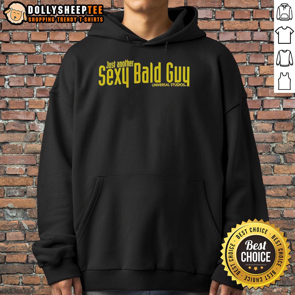 Pretty Just Another Sexy Bald Guy Universal Studios Hoodie Alt Text: Stylish bald guy wearing a sexy Universal Studios hoodie, showcasing a trendy urban fashion look.
