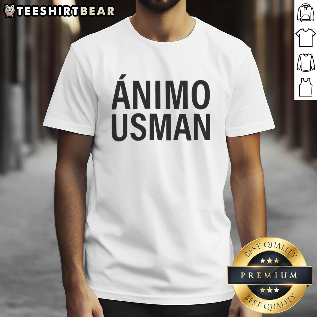 pretty-real-madrid-players-with-stay-strong-usman-t-shirt Real Madrid players wearing 'Stay Strong Usman' T-shirts, showcasing support and unity in a vibrant team atmosphere.