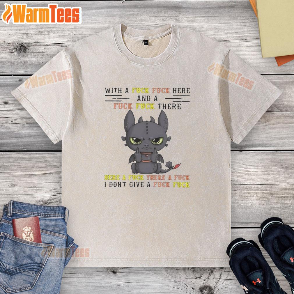 pretty-toothless-dragon-with-a-fck-fck-here-and-a-fck-fck-there-here-a-fck-there-a-fck-washed-t-shirt Alt Text: Adorable toothless dragon wearing a whimsical 'Fck Fck Here And A Fck Fck There' T-shirt in a colorful setting.