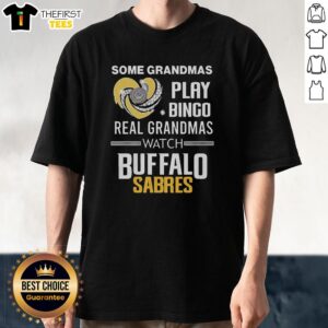 Top Buffalo Sabres T-Shirt: 'Some Grandmas Play Bingo, Real Grandmas Watch Buffalo Sabres' design on a blue shirt.