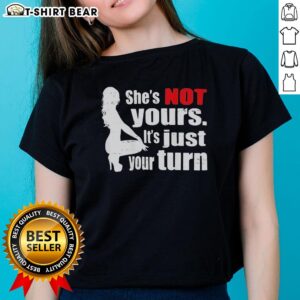 Original 'The Woman Squatting' ladies tee with the phrase 'She's Not Yours, It's Just Your Turn' in bold lettering.