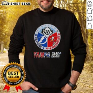 Alt Text: Tampa Bay Rays, Lightning, and Buccaneers mashup logos on a stylish team sweatshirt, perfect for sports fans.