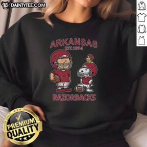 Good Charlie Brown and Snoopy Arkansas Razorbacks NCAA Football sweatshirt, established 1894, perfect for sports fans.