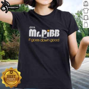 Hot Mr. Pibb drink in a stylish ladies tee, perfect for a refreshing sip and casual wear. Enjoy it goes down good!