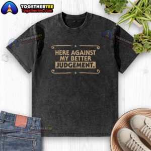 Model wearing a 'Pretty Here Against My Better Judgement' washed t-shirt, showcasing a stylish casual look.