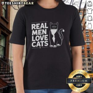 Official Real Men Love Cats Ladies Tee featuring a stylish cat graphic, perfect for cat lovers and fashion enthusiasts.