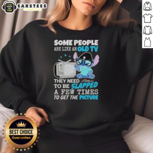 Alt Text: Cute sweatshirt featuring the phrase Some people are like an old TV, they need to be slapped in a playful design.