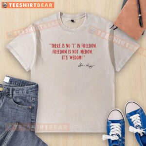 Alt Text: Charlie Kirk signature washed t-shirt with 'Freedom is not me, it's we' slogan, ideal for patriotic fashion lovers.