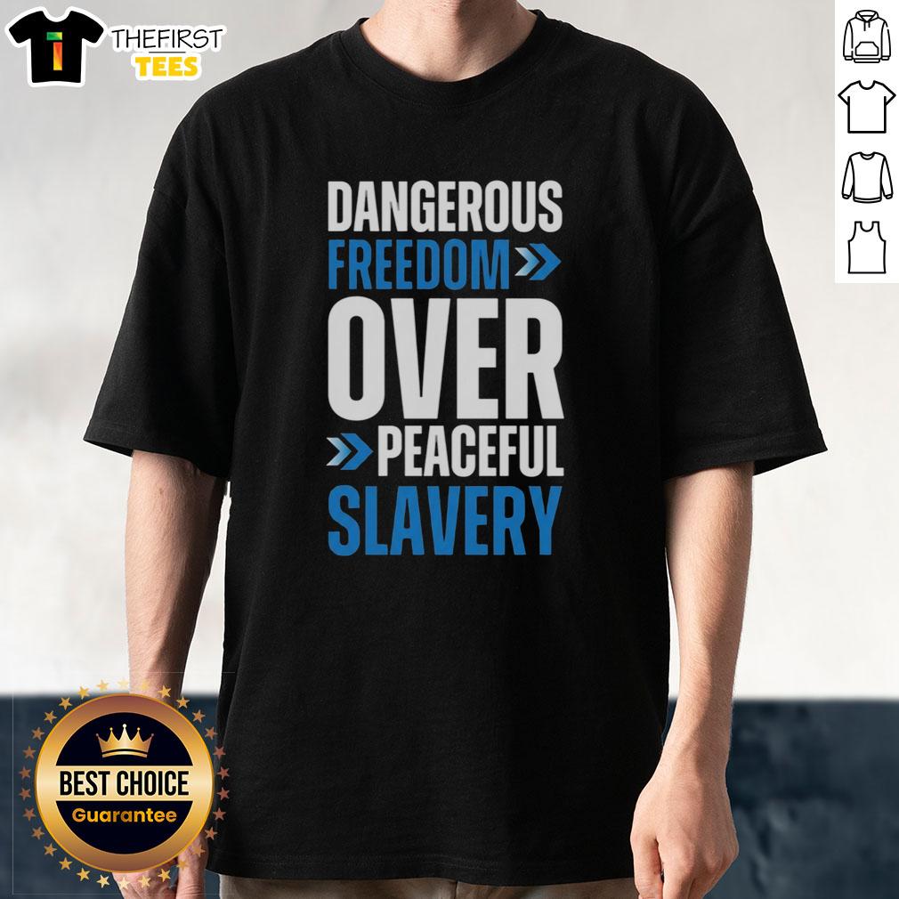 top-dangerous-freedom-over-peaceful-slavery-t-shirt Alt Text: Top Dangerous Freedom Over Peaceful Slavery T-Shirt featuring bold text design in vibrant colors on a black background.