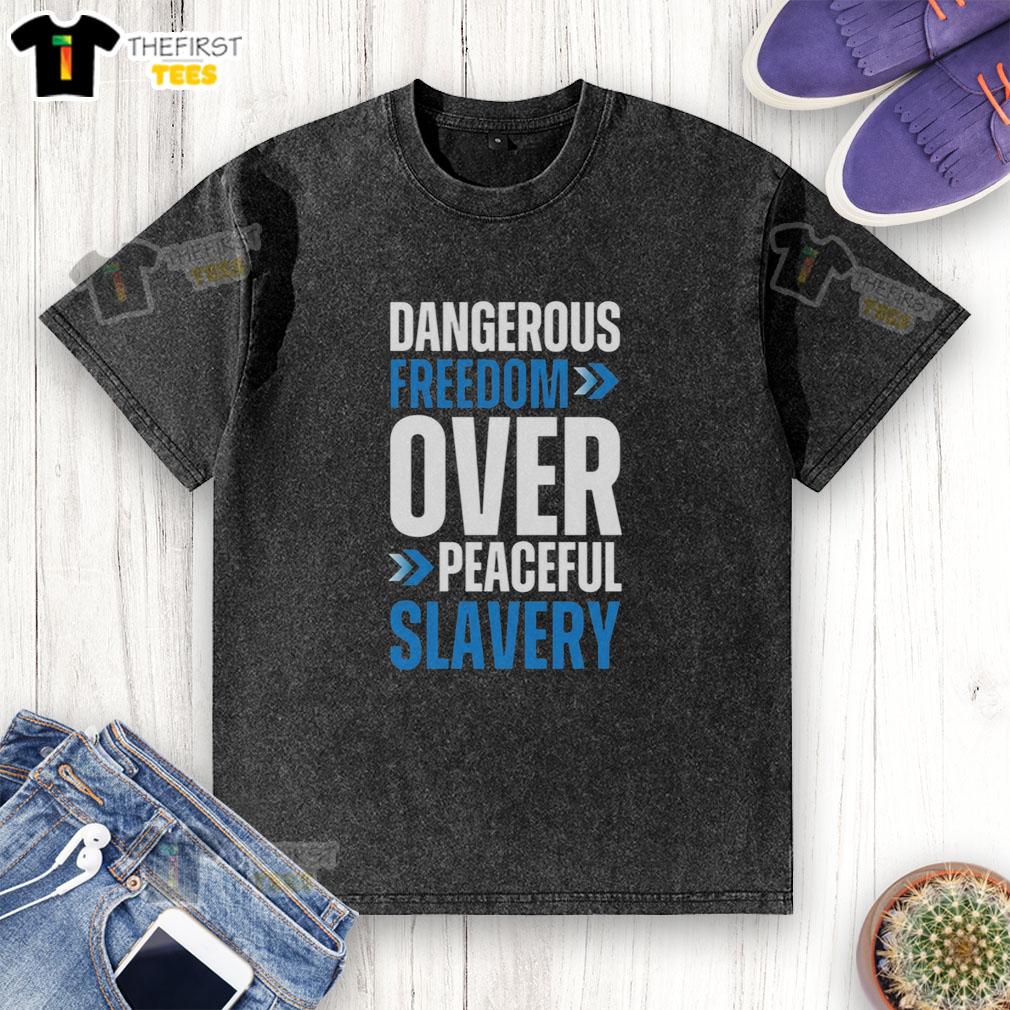top-dangerous-freedom-over-peaceful-slavery-washed-t-shirt Alt Text: Top Dangerous Freedom Over Peaceful Slavery washed t-shirt featuring a bold graphic design and soft fabric.