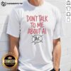 Trendy 'Don't Talk To Me About AI' T-shirt design featuring bold text on a casual black background.