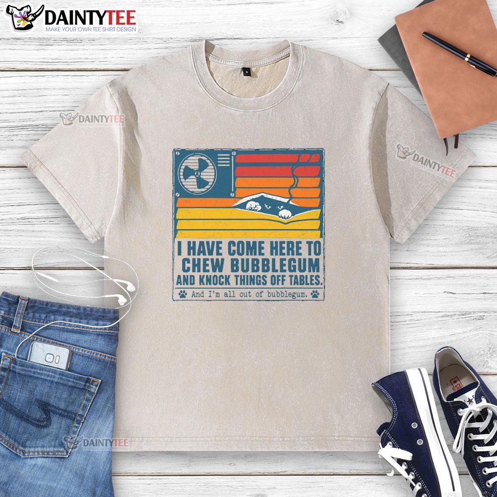 top-i-have-come-here-to-chew-bubblegum-washed-t-shirt Top I Have Come Here To Chew Bubblegum washed t-shirt displayed on a wooden background, perfect for casual wear.