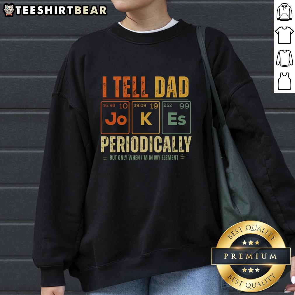 top-i-tell-dad-jokes-periodically-sweatshirt Alt Text: Cozy 'Top I Tell Dad Jokes Periodically' sweatshirt in a casual setting, perfect for dad joke enthusiasts.
