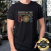 Top I Was Raised In The 80S T-Shirt featuring retro design and vibrant colors, perfect for nostalgic 80s fashion lovers.
