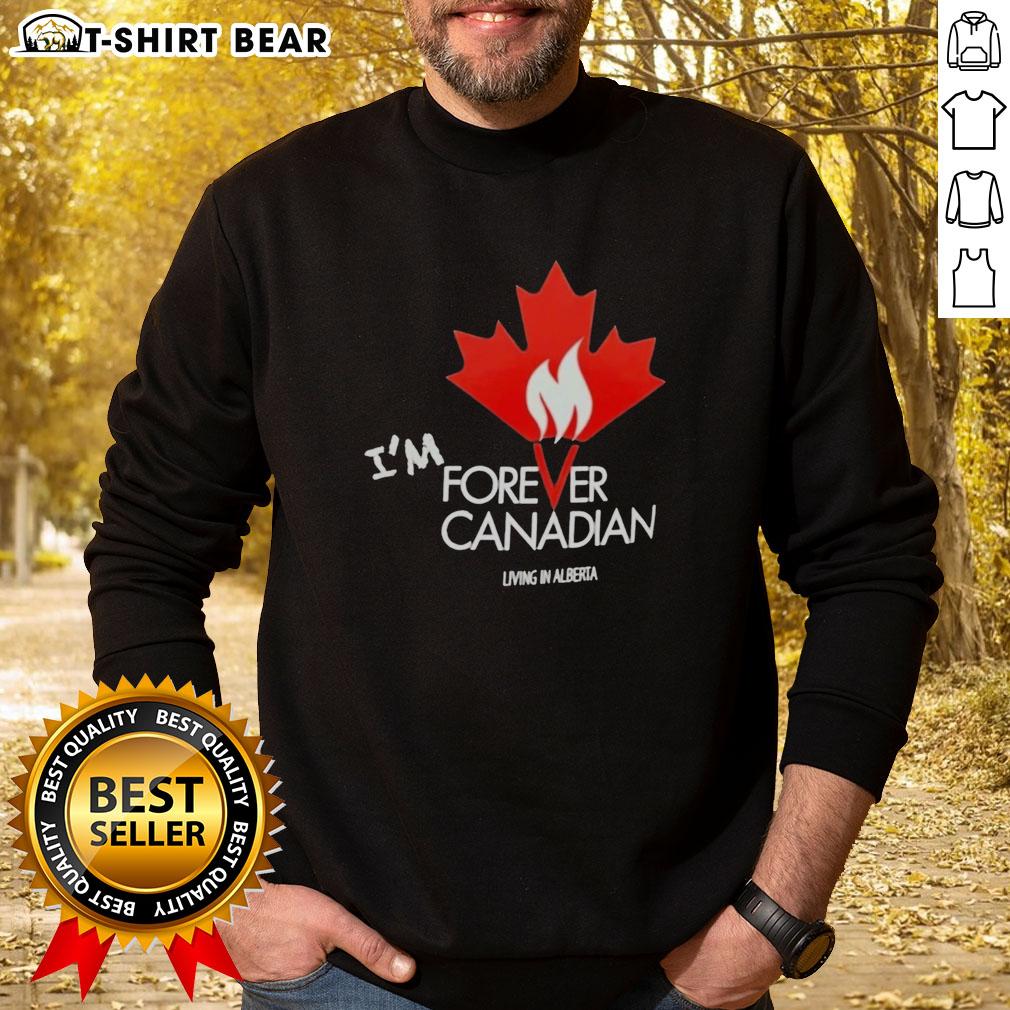 Top I'm Forever Canadian Living In Alberta Patriotic Maple Leaf Flame Sweatshirt Top Im Forever Canadian living in Alberta sweatshirt featuring a patriotic maple leaf flame design for proud Canadians.
