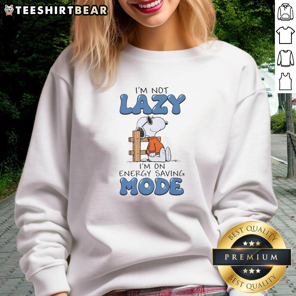 top-im-not-lazy-im-on-energy-saving-mode-snoopy-sweatshirt Alt Text: Cozy Snoopy sweatshirt with 'I'm not lazy, I'm on energy-saving mode' slogan, perfect for casual outfits.