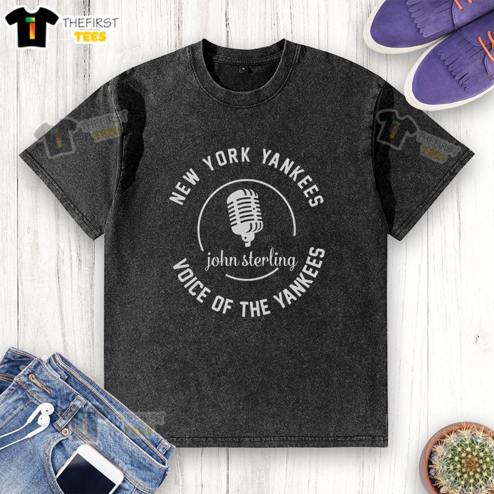 top-john-sterling-voice-of-the-new-york-yankees-washed-t-shirt Alt Text: Top John Sterling Voice of the New York Yankees washed t-shirt featuring bold graphics and a comfortable fit.