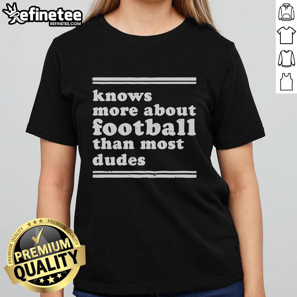 top-knows-more-about-football-than-most-dudes-ladies-tee Top Knows More About Football Than Most Dudes Ladies Tee showcasing a stylish design for football-loving women.