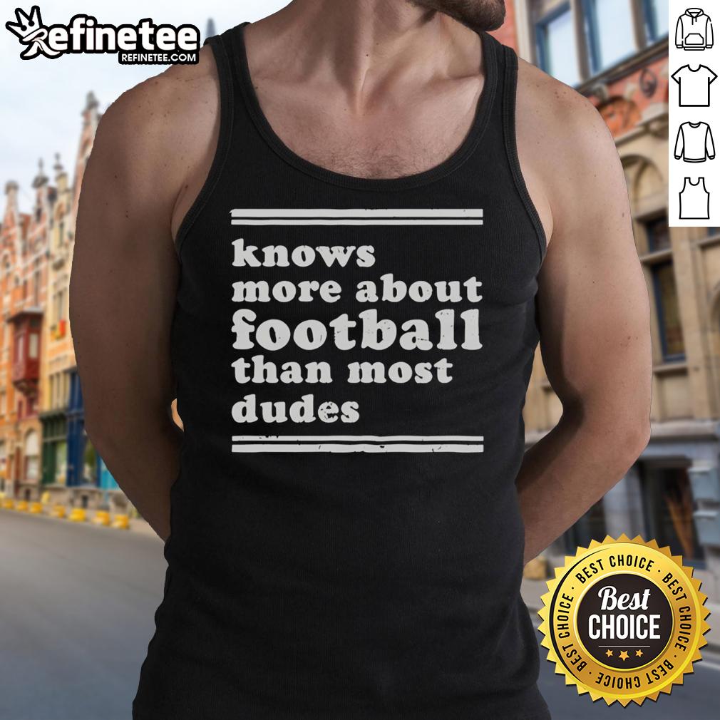 top-knows-more-about-football-than-most-dudes-tank-top Stylish tank top with 'Knows More About Football Than Most Dudes' print, perfect for football fans and casual wear.