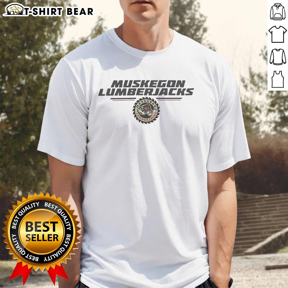 Top Muskegon Lumberjacks Nhl Cogwheel Logo T Shirt Top Muskegon Lumberjacks NHL cogwheel logo t-shirt showcasing team colors and emblem for dedicated fans.