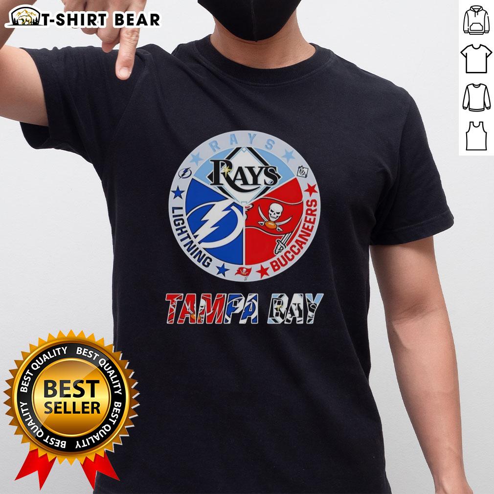 Top Tampa Bay Rays Tampa Bay Lightning And Tampa Bay Buccaneers Mashup Logos Team T-Shirt Top Tampa Bay Rays, Lightning, and Buccaneers mashup logo team T-shirt showcasing vibrant sports designs.