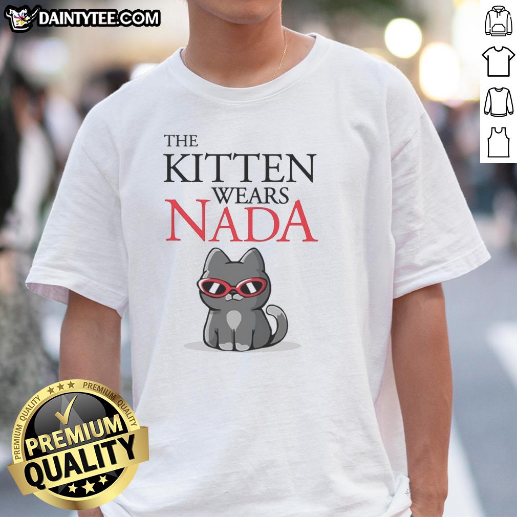 top-the-kitten-wears-nada-cat-sunglasses-t-shirt Top The Kitten wearing 'Nada' cat sunglasses t-shirt, showcasing a playful design perfect for cat lovers and fashion enthusiasts.