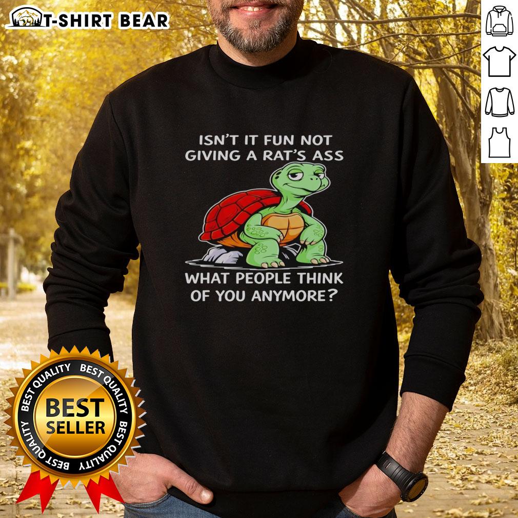Top Turtle Isn't It Fun Not Giving A Rat's Ass What People Think Of You Anymore Sweatshirt Cozy black sweatshirt with 'Isn't It Fun Not Giving A Rat's Ass What People Think of You Anymore' graphic design.