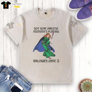 Awesome Not Now Sweetie Mommy's Playing Baldur's Gate 3 washed t-shirt design featuring a gamer mom graphic.
