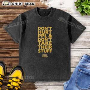 Original 'Don't Hurt People and Don't Take Their Stuff' washed t-shirt in a casual setting, promoting kindness and respect.