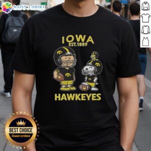 Official Charlie Brown and Snoopy X Iowa Hawkeyes NCAA Football T-Shirt, established 1891, featuring playful graphics.
