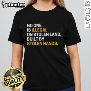 Official No One Is Illegal On Stolen Land Tee showcasing a sarcastic message about immigration and colonialism.