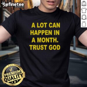 Premium 'A Lot Can Happen In A Month' Trust God T-Shirt with inspirational design and comfortable fit for everyday wear.