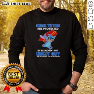 Alt Text: Good Stitch sweatshirt featuring 'These Titties Are Protected By A Smokin Hot Crazy Guy' design, perfect for bold fashion.