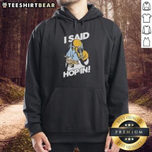 Alt Text: Mr. Burns holding a pistol and model aircraft in 'I Said Hop In' meme hoodie, showcasing a humorous scene.
