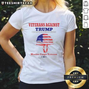 Marine Corps veteran wearing 'Top Veterans Against Draft Dodger In Chief' ladies tee, promoting military integrity and values.