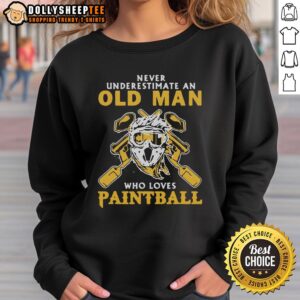 Graphic sweatshirt featuring 'Never Underestimate an Old Man Who Loves Paintball' slogan, perfect for paintball enthusiasts.