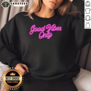 Purple neon sweatshirt with 'Good Vibes Only' text, perfect for a trendy and positive casual look.
