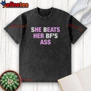 Official She Beats Her BFs Ass Text Washed T-Shirt featuring bold graphic design on a stylish, relaxed fit tee.
