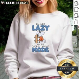 Alt Text: Cozy Snoopy sweatshirt with 'I'm not lazy, I'm on energy-saving mode' slogan, perfect for casual outfits.