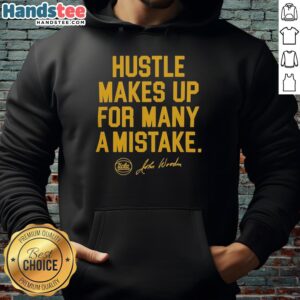 UCLA Bruins basketball players hustling on the court in a 2026 hoodie inspired by Coach John Wooden's legacy.