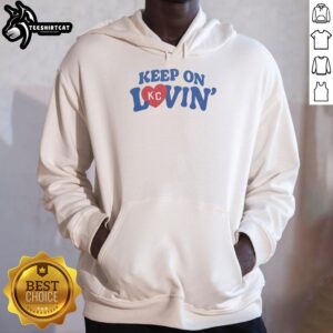 Vintage hoodie featuring 'Keep On Kc Lovin' design, perfect for stylish comfort and Kansas City fans.