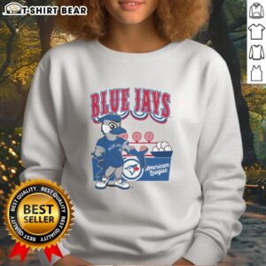 Alt Text: Top Mitchell & Ness cream Toronto Blue Jays Step Back Up sweatshirt showcasing stylish MLB fan apparel.