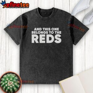 Ashley Davis wearing a 'This One Belongs To The Reds' washed t-shirt, showcasing casual style and team spirit.