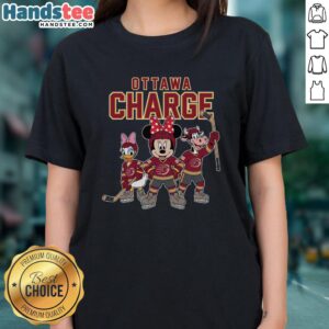 Cartoon team of ladies in ice hockey gear, featuring Nice Ottawa Charge logo on a stylish tee shirt.