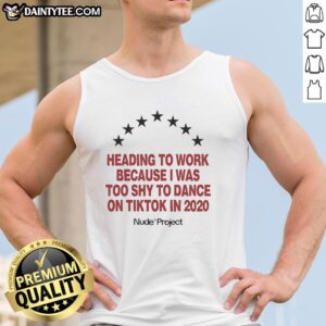 Person wearing a nude Seven Stars tank top, heading to work, reflecting on shyness about dancing on TikTok in 2020.