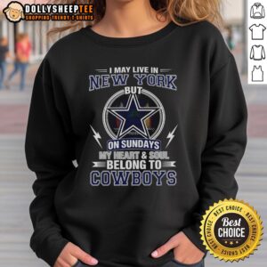 Dallas Cowboys NFL sweatshirt with 'I may live in New York, but my heart belongs to Cowboys' slogan.
