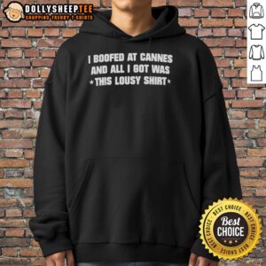 Person wearing a 'Top I Boofed at Cannes' hoodie, showcasing unique festival fashion and humor at Cannes Film Festival.
