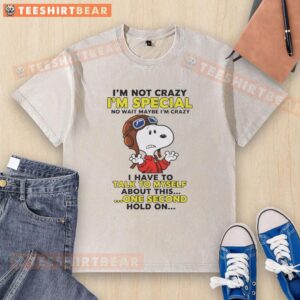 Washed t-shirt featuring the phrase 'Pretty I'm Not Crazy, I'm Special' in a playful font, perfect for casual wear.