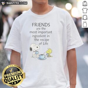 Cartoon T-shirt featuring Snoopy and friends with the phrase 'Important Ingredient In The Recipe Of Life' for dog lovers.